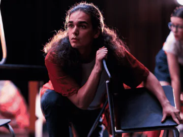 An actor performing on stage