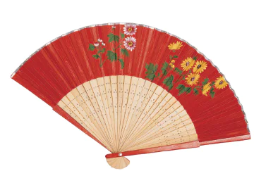 A red paper fan painted with white and yellow flowers on it