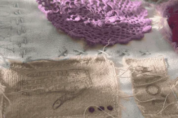 Pieces of fabric, burlap and crochet stitched together