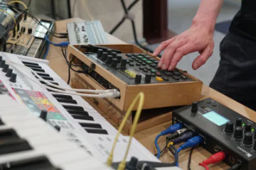 A musician playing a synthesiser
