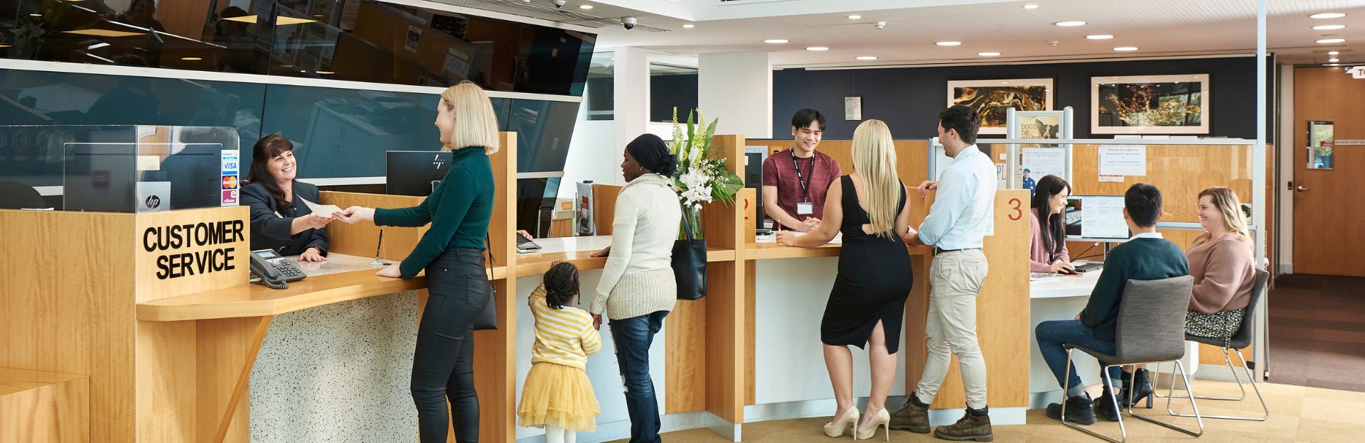 People paying at a counter