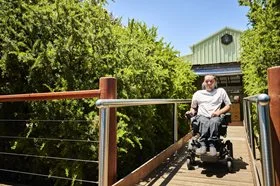 A man using a ramp at a cafe