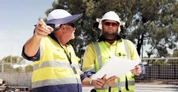Trainee Phil gets on site instructions from a City staff member