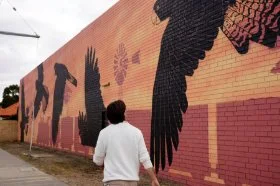 Black Cockatoo mural alongside Midland IGA