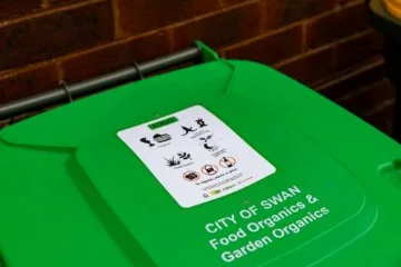 A City of Swan lime-green lid FOGO bin