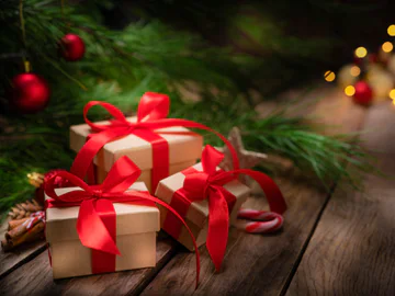 Christmas presents wrapped in red ribbon