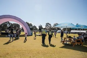 Two police officers patrolling together as event security