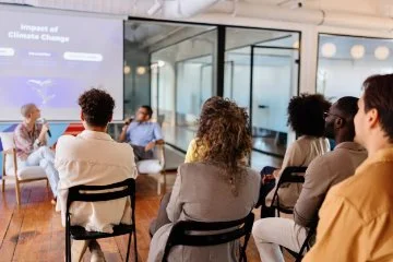 Group of people watching a presentation
