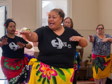 Women dancing during a hot hula program