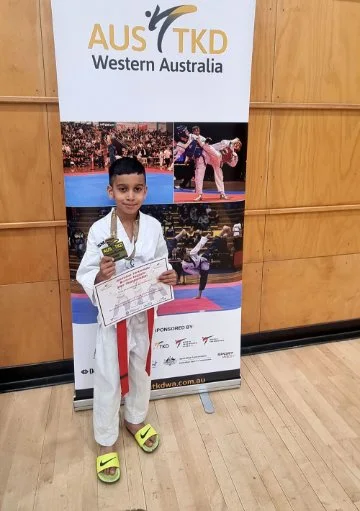 Aarav Nagaraju competed in the Taekwondo WA State Championship and won gold in his division.