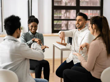A group of people in an Auslan class
