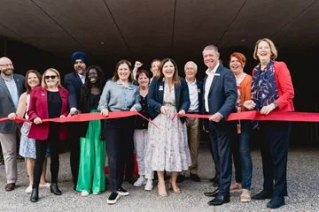 Mayor Tanya Richardson cuts the red ribbon to open Swan Active Midland surrounded by Council Members.
