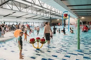 Children play in the indoor pool.