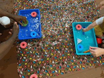 Children and adult's hands playing with sensory toys